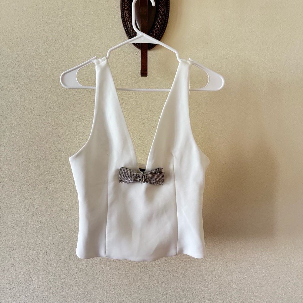 Zara Elegant White Sleeveless Top with Embellished Bow Accent